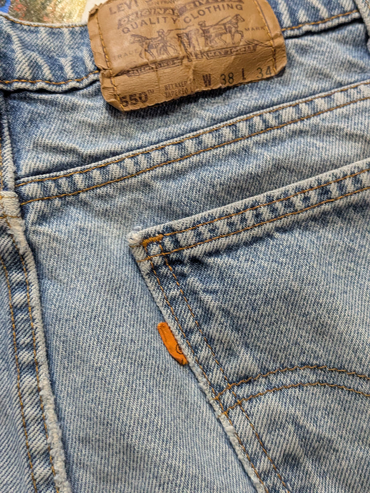 FOMO Collection - Levi 550 Vintage Made in USA Orange Tab Manifesto  - waist = 36" - 13734